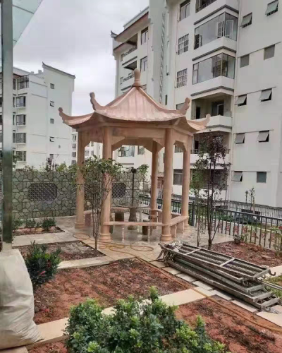 小區(qū)園林石涼亭，晚霞紅大理石石雕亭子