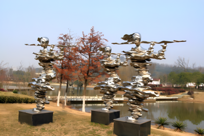 戶外景區(qū)不銹鋼抽象吹笛子的人物雕塑